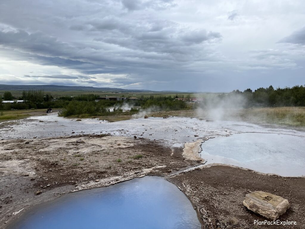 Blesi geyser at Geysir geothermal area - its shape resembling a pair of glasses.