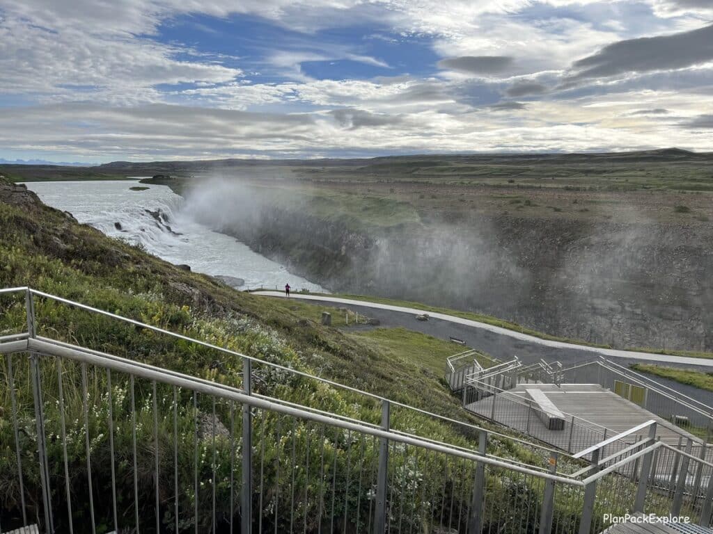 Staircase leading from the lookout to the Gullfoss Waterfall path below. You can see the falls as well.