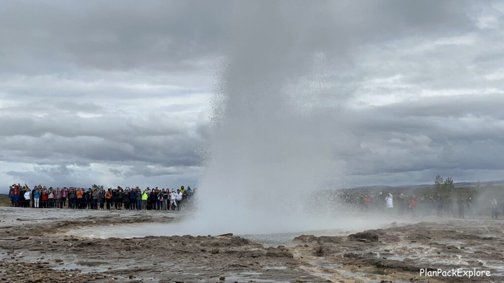 Geyser named Strokkur erupting at Geysir Geothermal Area in Iceland