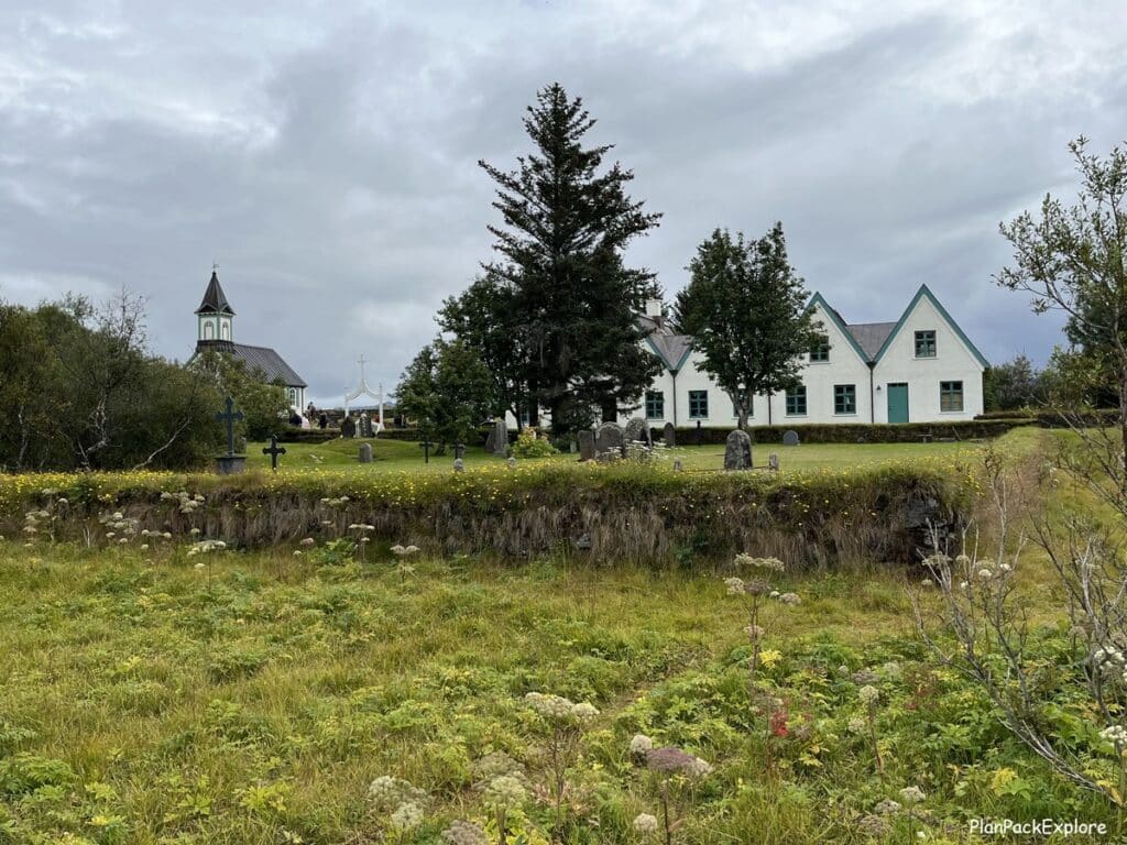 Thinvallarbær - white buildings with green roofs, serving as the official summer residence of the Icelandic Prime Minister.