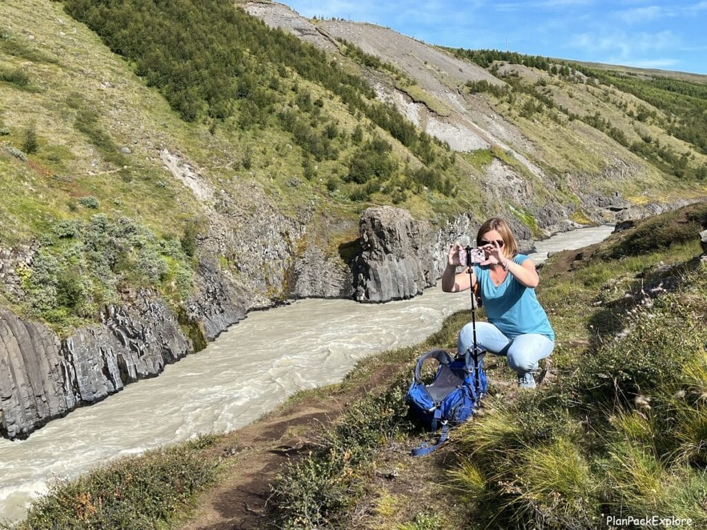 Author taking a photo near Stdlagil Canyonin Iceland.