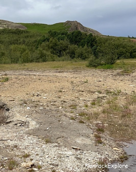 Mt. Laugarfjall at geysir Geothermal Area with a viewing platform at the summit.