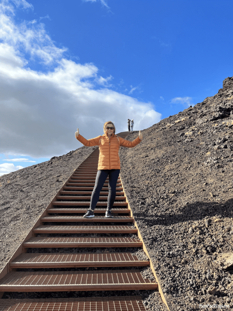 Climbing the stairs to the top of Saxholl Crater on Snaefellsnes Peninsula.