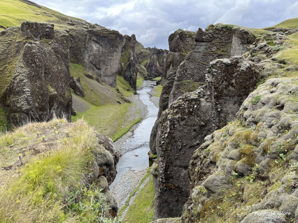 Fjadragljufur Canyon in South Iceland. Moss-covered cliffs with the river at their base.