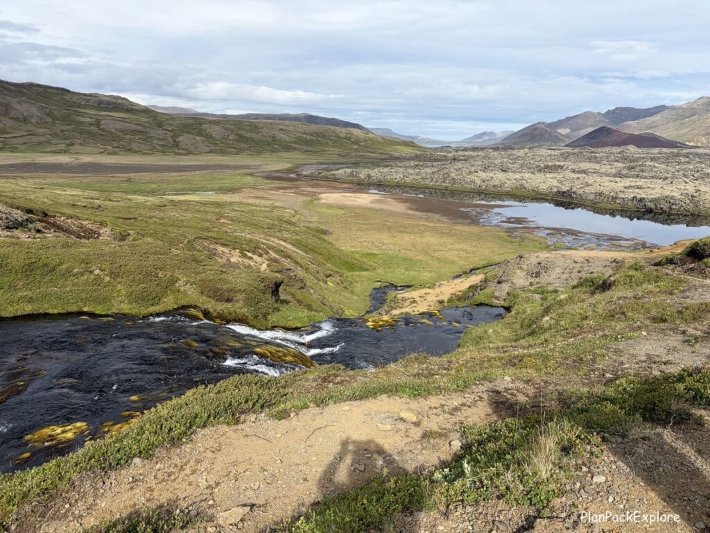 A view of a lava field, a river and a mountain on Snaefellsnes Peninsula in Iceland.
