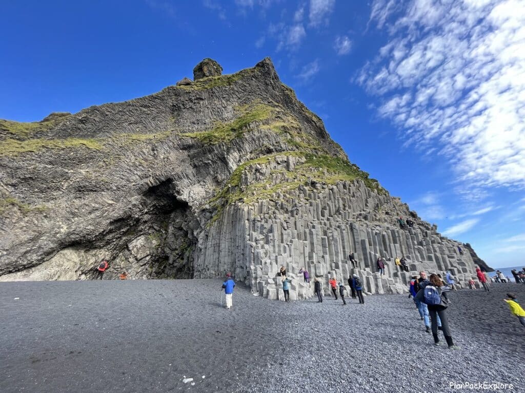 Basalt sea stacks at Reynisfjara black sand beach in South Iceland.
