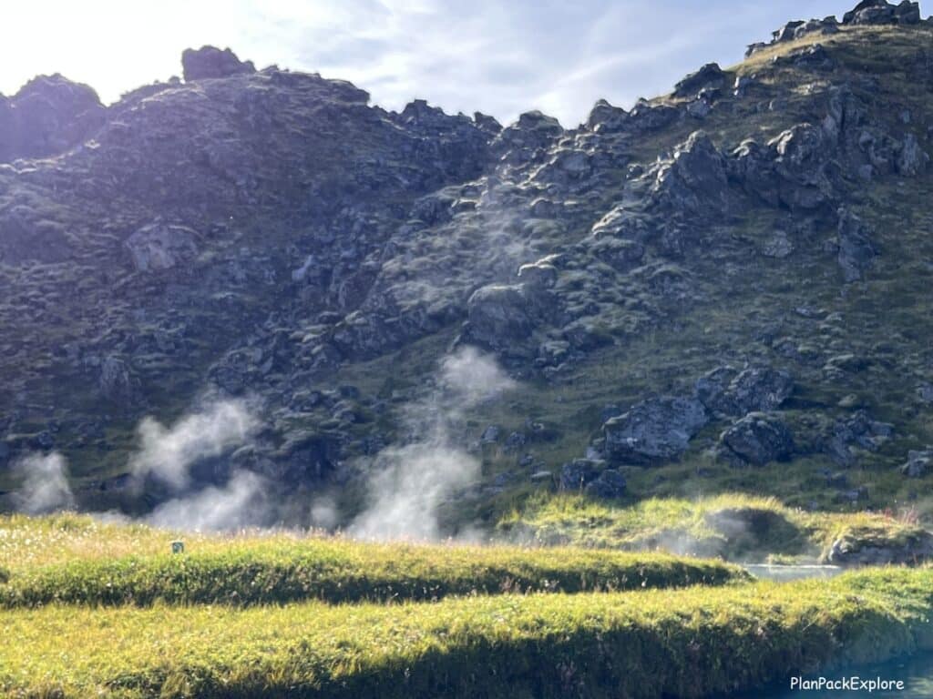 Steam rising above the People's Pool - a hot spring in Landmannalaugar, Iceland.