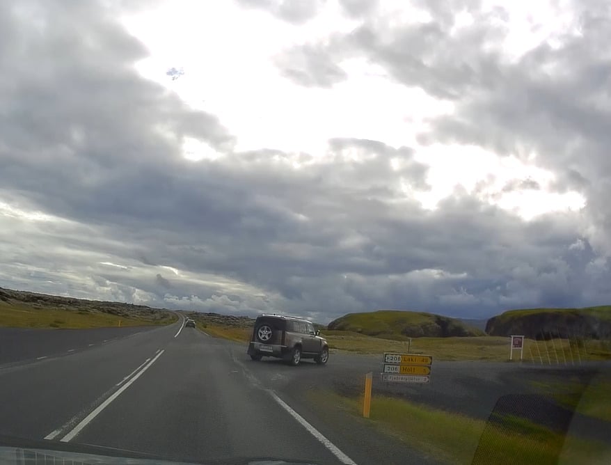Sign directing to Fjaðrágljúfur Canyon from the Ring Road in Soutesat Iceland.