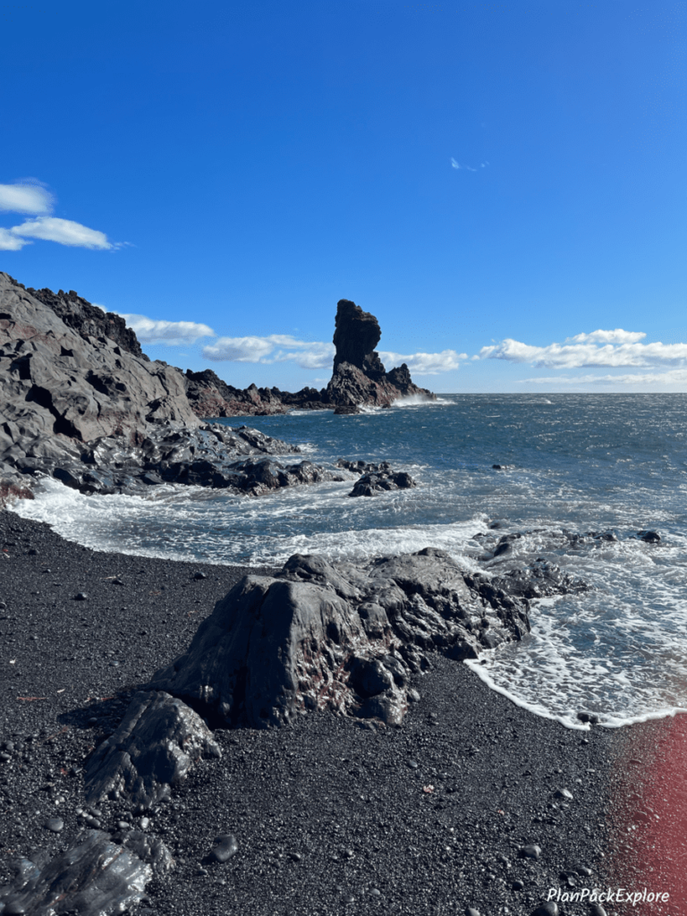 A basalt rock formation called "Kerling" at Djupalonssandur beach on Snaefellsnes Peninsula in Iceland