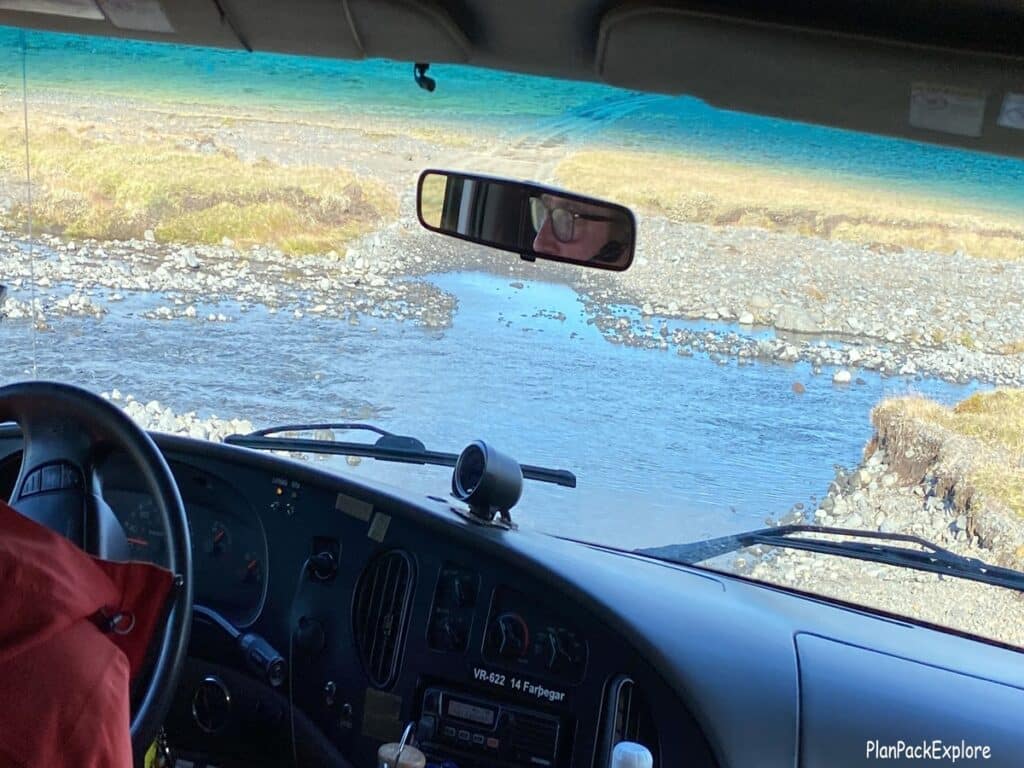 A river crossing in Iceland - view from a car windshield.