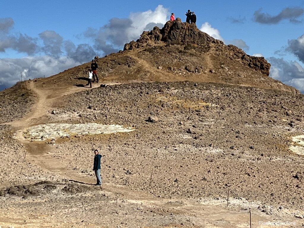 Hverir Namafjal geothermal Area near Lake Myvatn in Iceland - Pile of rocks forming a viewpoint on Mt. Namafjall trail.