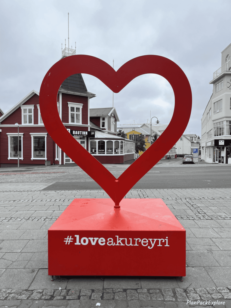 Akureyri, Iceland - a red heart-shaped cut-out photo prop sign.