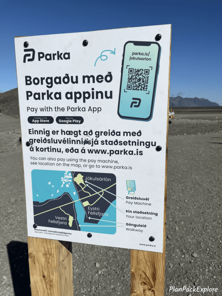 A payment options sign in the parking lot of Jokulsarlon glacier lagoon in Iceland.