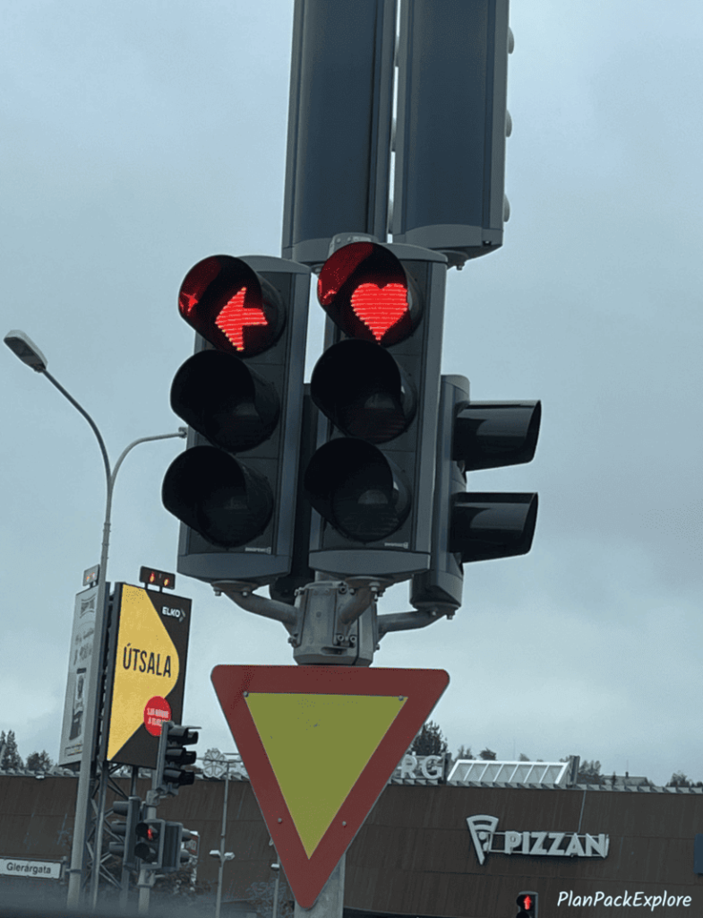 Akureyri, Iceland - a red heart-shaped traffic light.