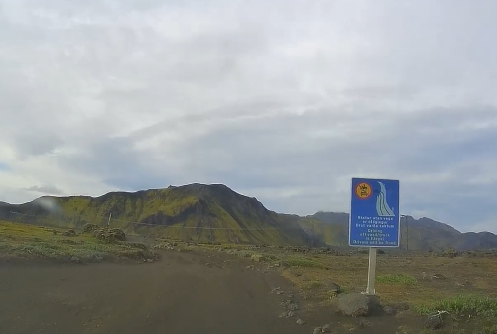 No off-roading blue square sign on a gravel road in the Highlands in Iceland.