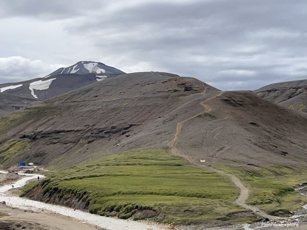 A narrow uphill trail on a mountain ridge in Kerlingarfjoll, Iceland.