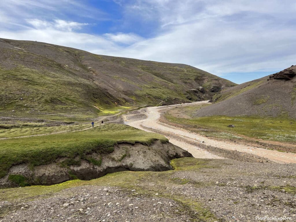 A wide view of the trail along the river in the mountains of Kerlingarfjoll, Iceland.