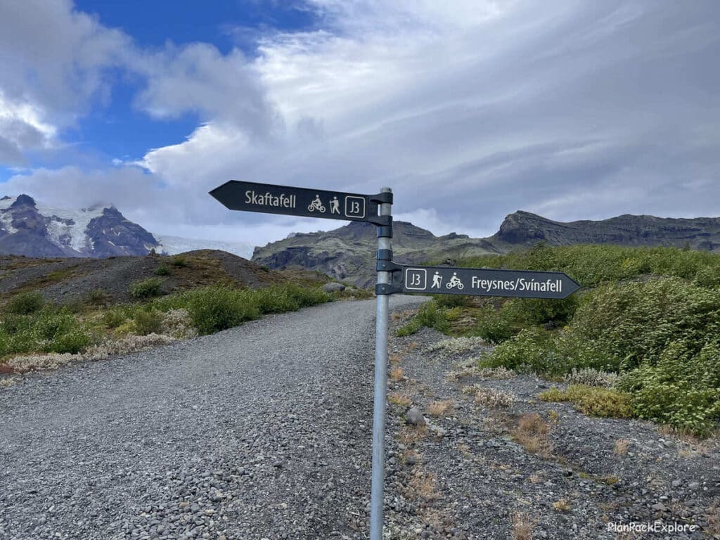 A trail sign for hiking paths at Svinafellsjokull glacier in Iceland.