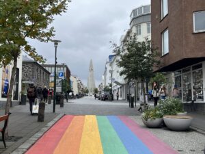 Rainbow color stripes painting on the street on Rainbow Street in Reykjavik, Iceland.
