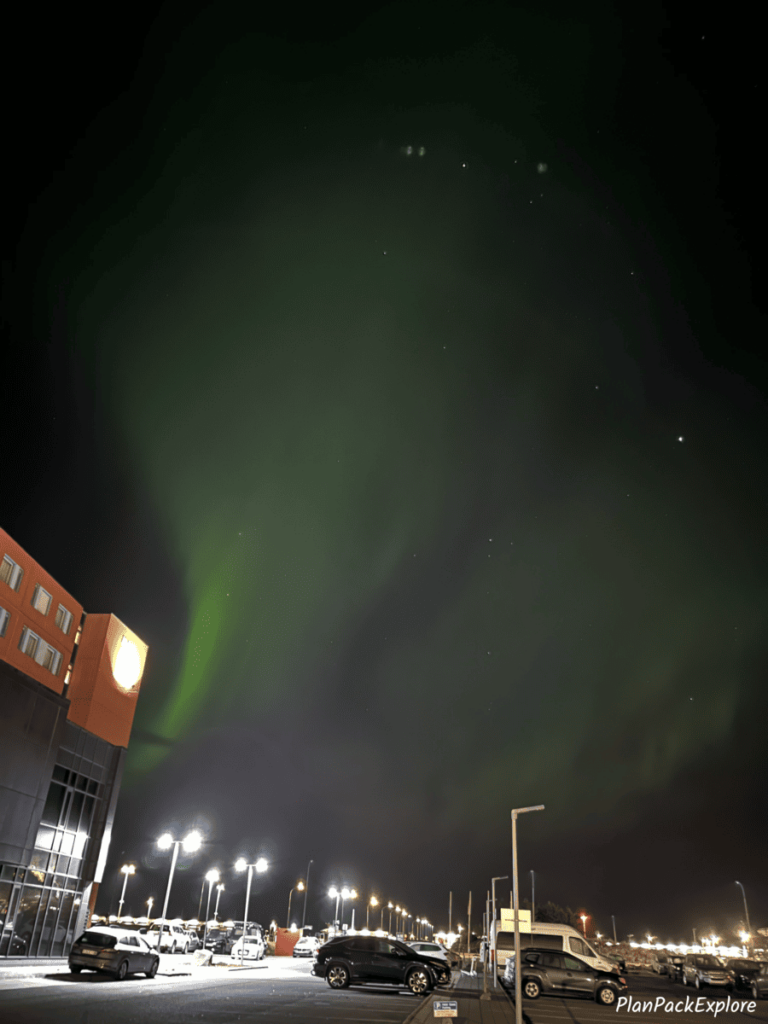 Green northern lights at the airport in Keflavik, Iceland.