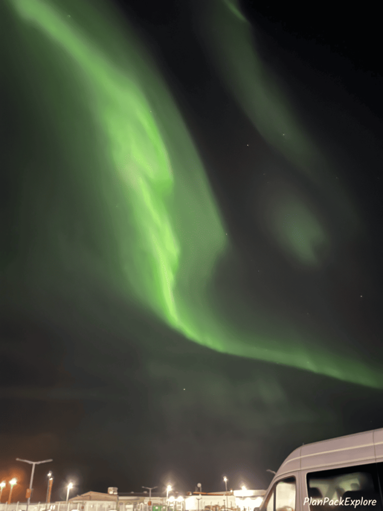 Green northern lights at the airport in Keflavik, Iceland.