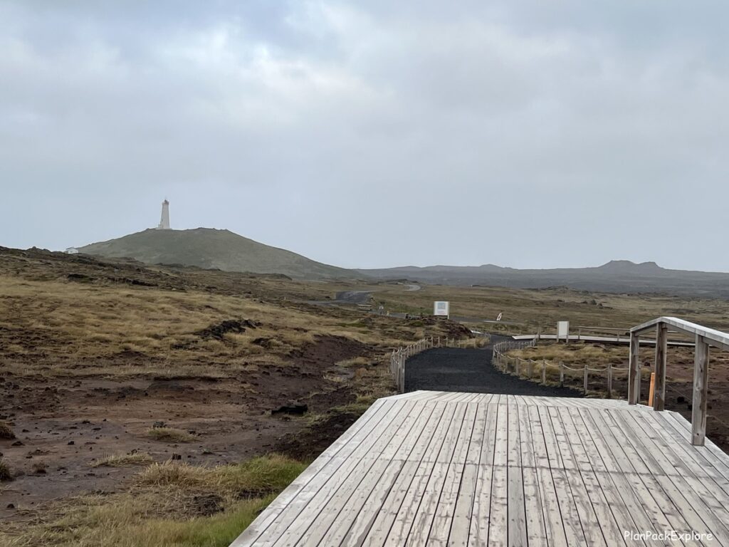 Reykjanes lighthouse visible from Gunnuhver hot springs on reykjanes peninsula in Iceland.