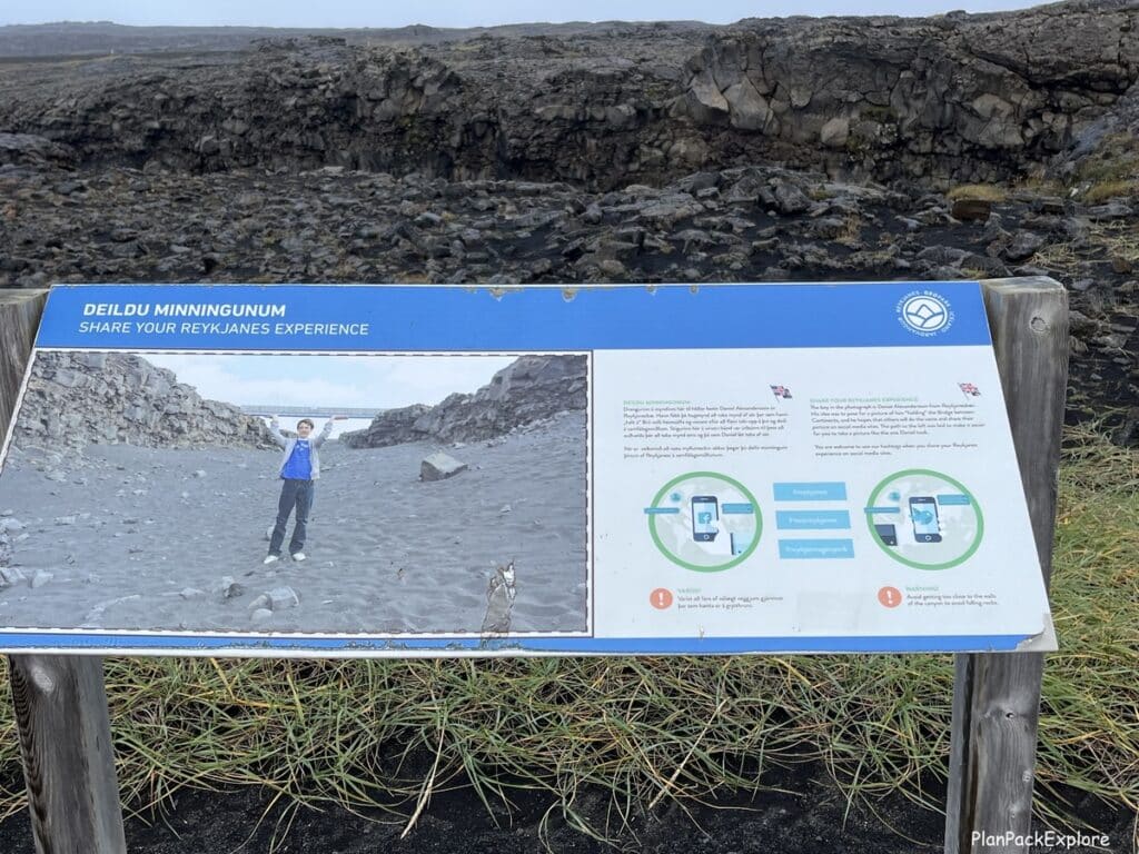 An info sign explaining how to take a picture of the bridge between continents on reykjanes peninsula in Iceland.