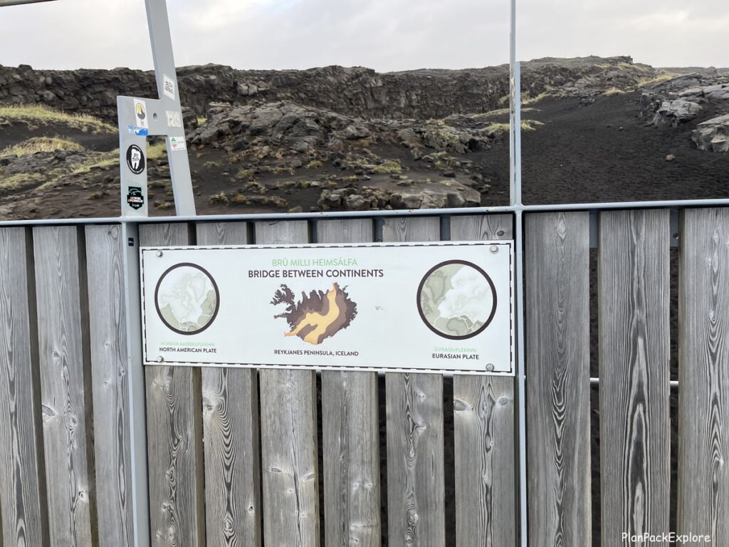 An info sign naming the tectonic placed at the bridge between continents on reykjanes peninsula in Iceland.