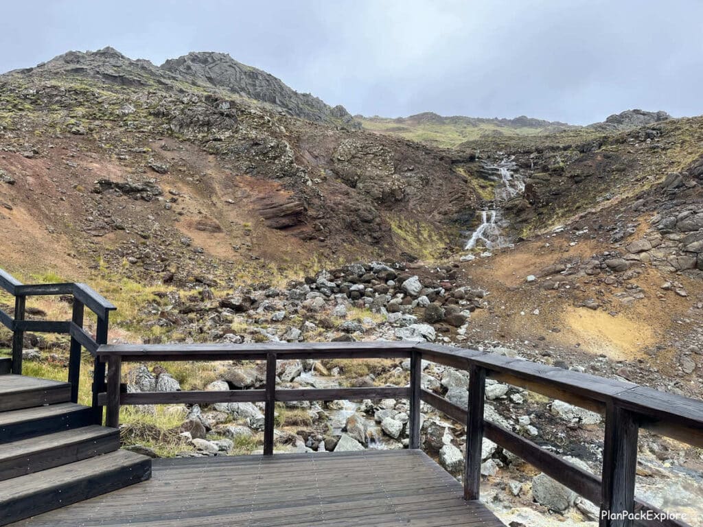 A small waterfall viewed from a wooden deck in Seltun on reykjanes peninsula in Iceland.