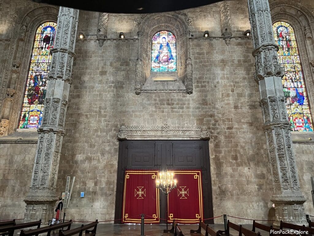 Colorful stained-glass windows inside the Santa maria church at Jeronimos Monastery in Lisbon.