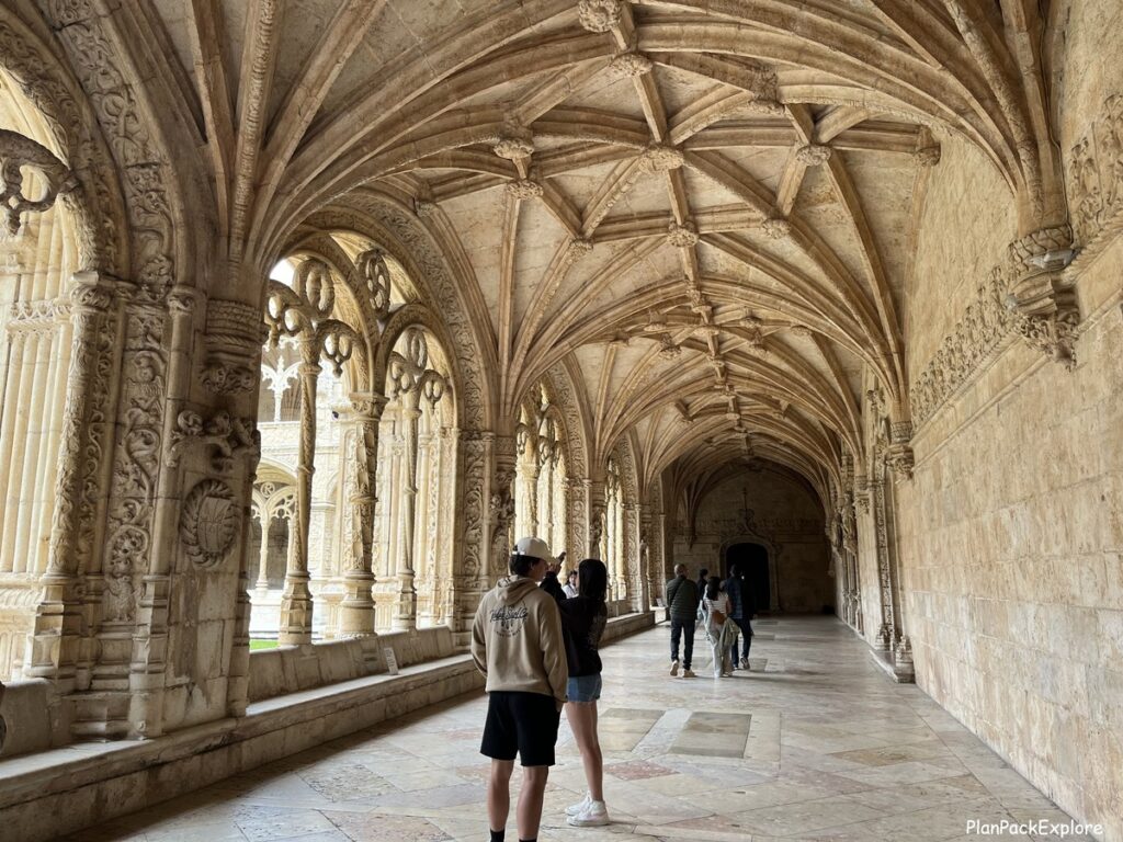 A view of the inside of the cloister with carved ceilings in Jeronimos Monastery, in lisbon.