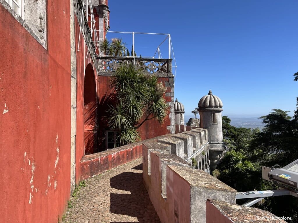 Red walls and a terrace at Pena palace in Sintra Portugal.