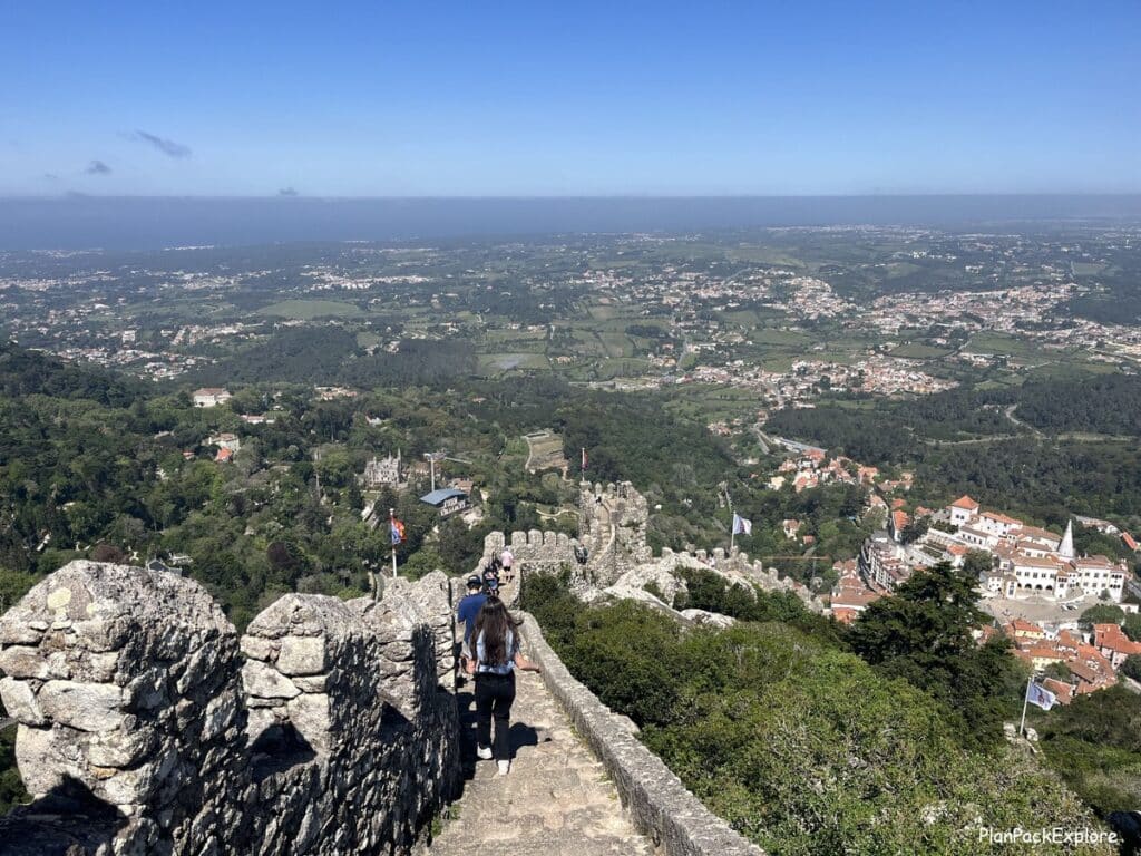 Stone steps of the Moorish Castle in Sintra, Portugal, with views of the area.