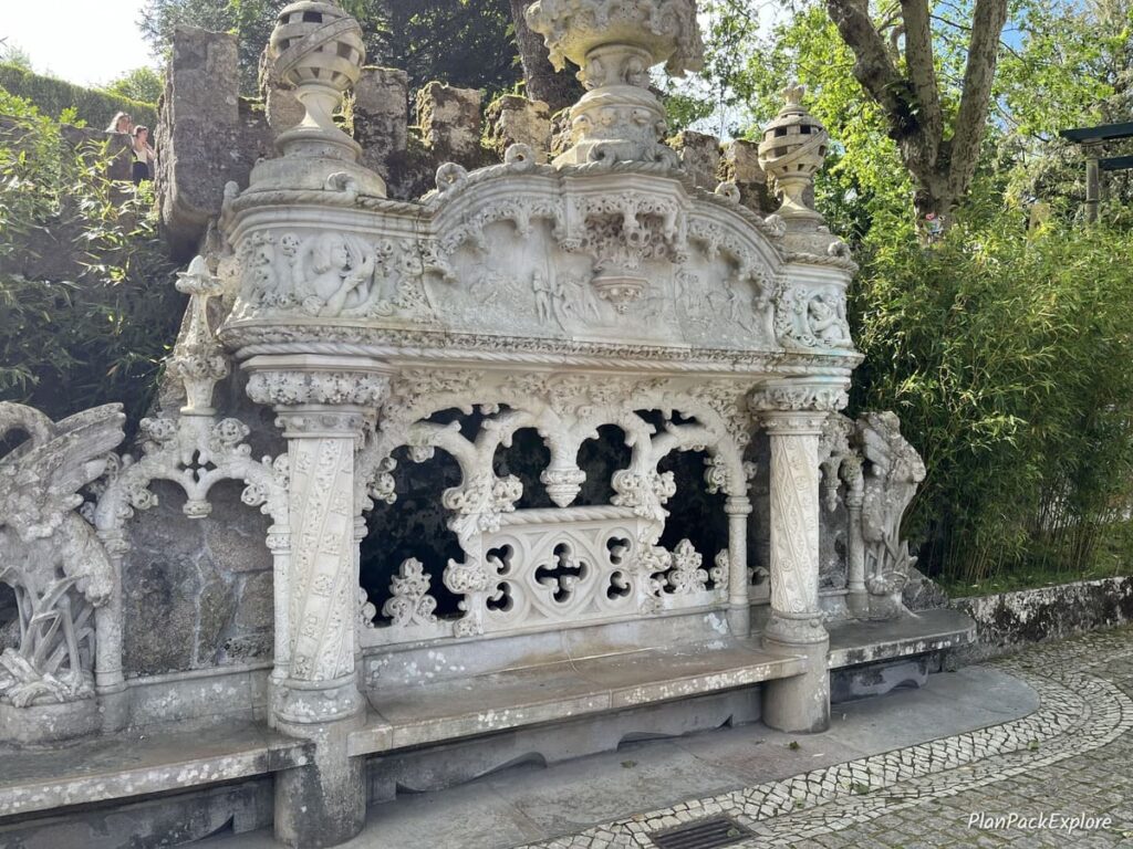 A stone carved bench at Quinta da Regaleira in Sintra Portugal.