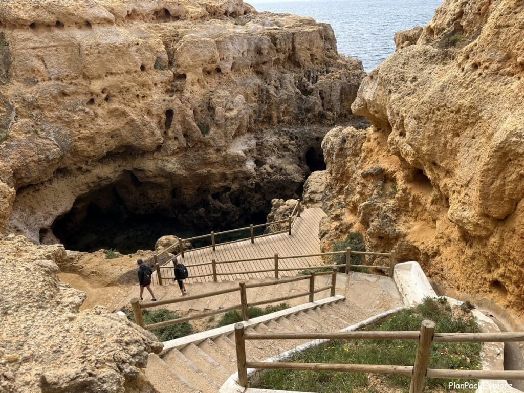 a staircase leading down towards a rock pool at Algar Seco in the Algarve, portugal.