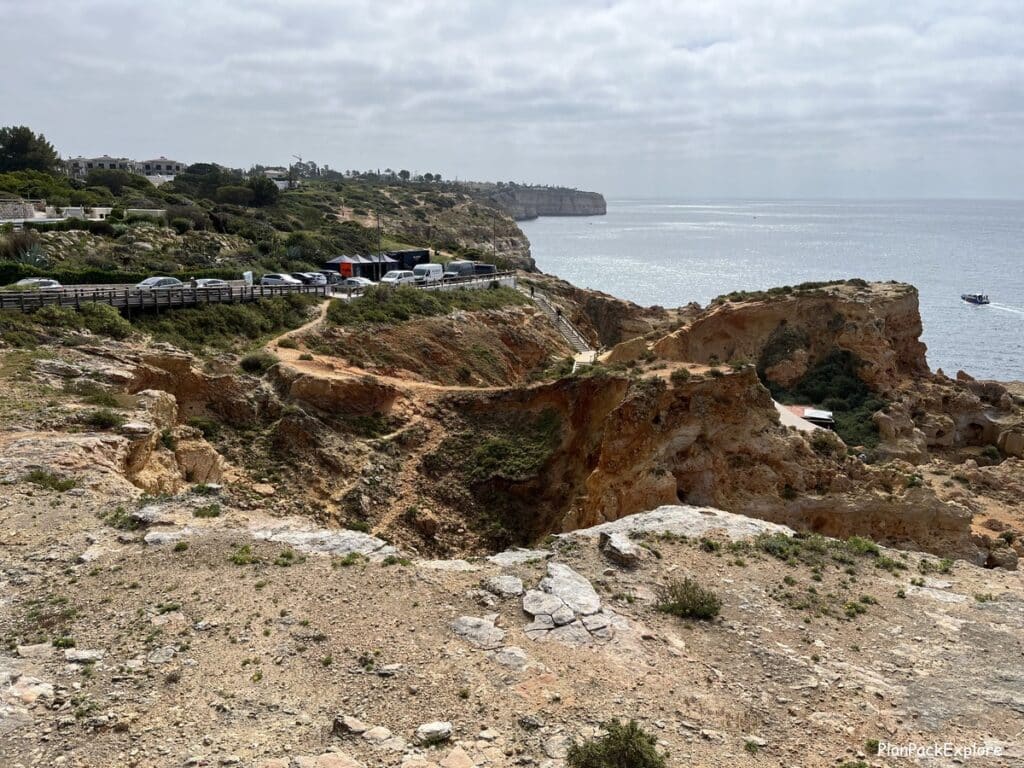 A view of the parking area and Algar Seco rock formations in the Algarve, Portugal.