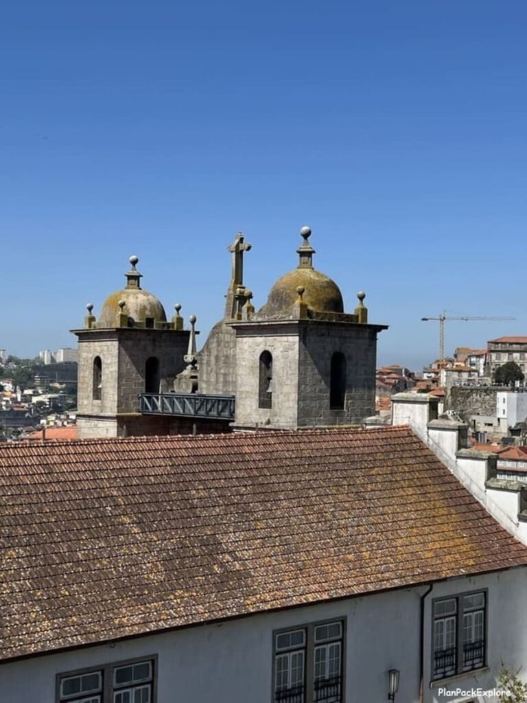 A rear view of the top part of the St. lawrence church and its bell towers in porto, portugal.