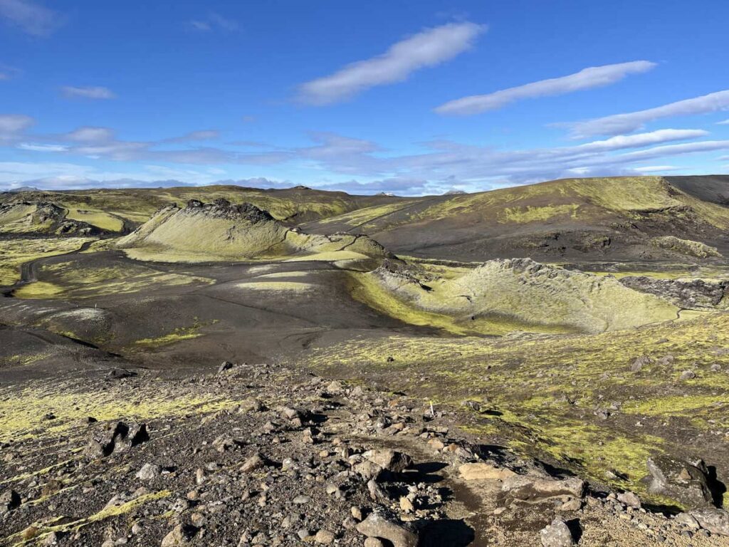 A row of moss-covered volcanic craters, called Laki Craters in Iceland.