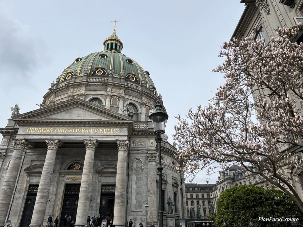 A church with a green dome in copenhagen denmark.