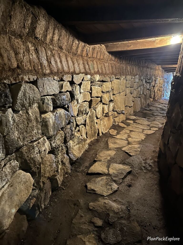 A stone lined underground tunnel under Skalholt Cathedral in Iceland.