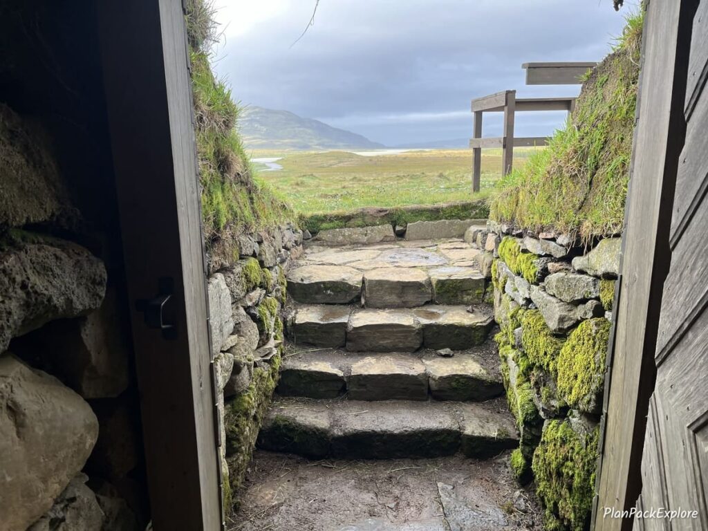 a set of stone steps leading outside from the tunnel under Skalholt Cathedral in Iceland.
