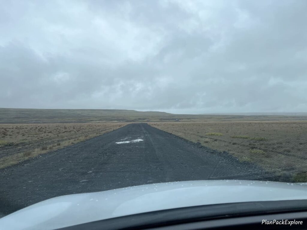 A gravel road in a lava field in Thjorsardalur Valley, Iceland.