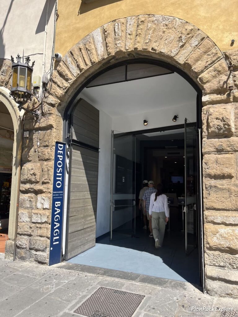 An entry door to the luggage storage place for the Florence Cathedral and the Duomo complex.