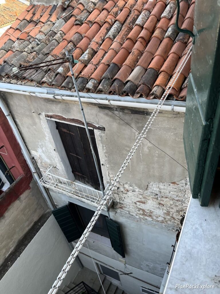 A clothesline and the rooftop of a building in Venice, Italy.