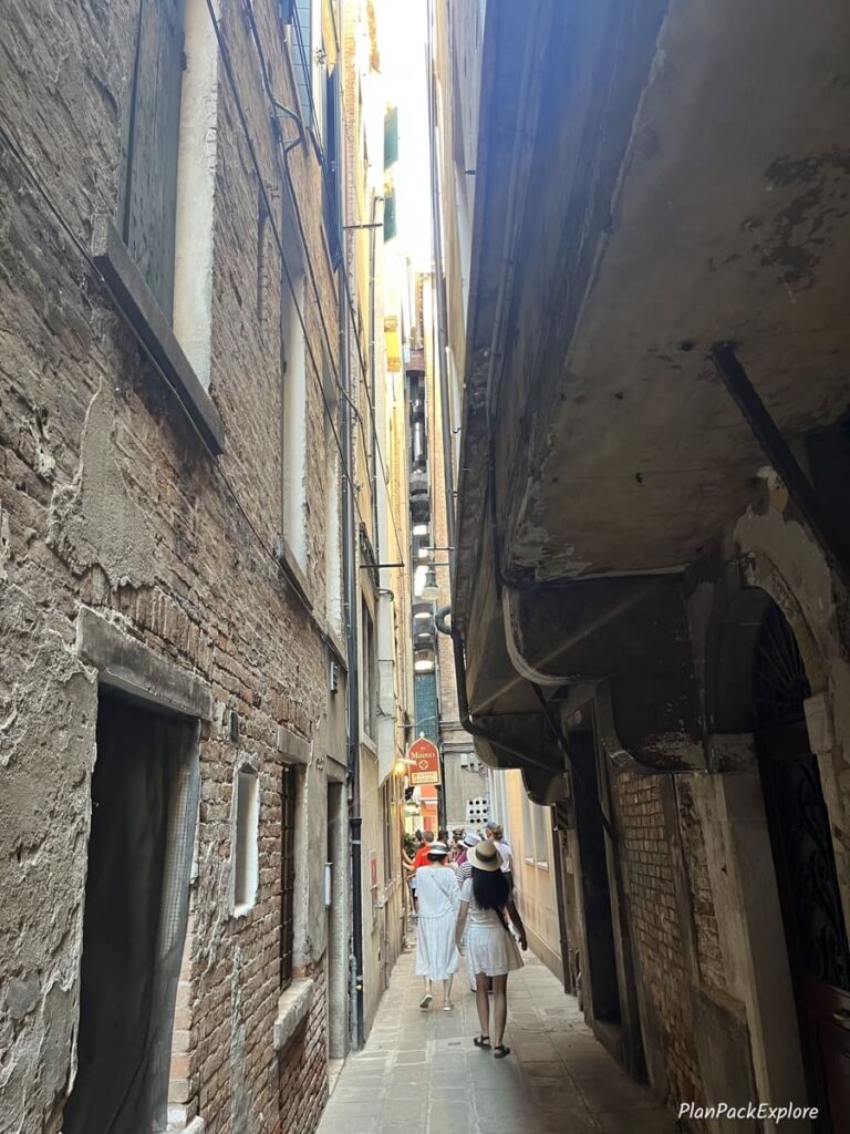 A very narrow alley in Venice, Italy.