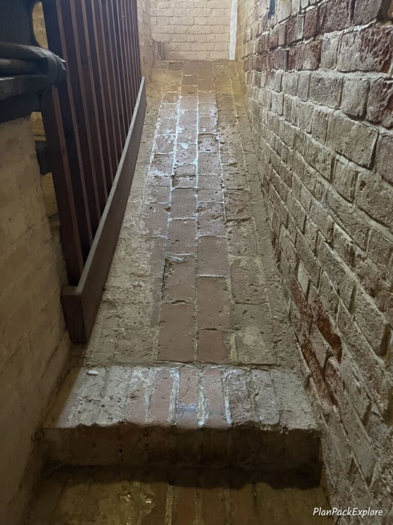 A narrow stone incline inside a bell tower on Torcello Island in Italy.
