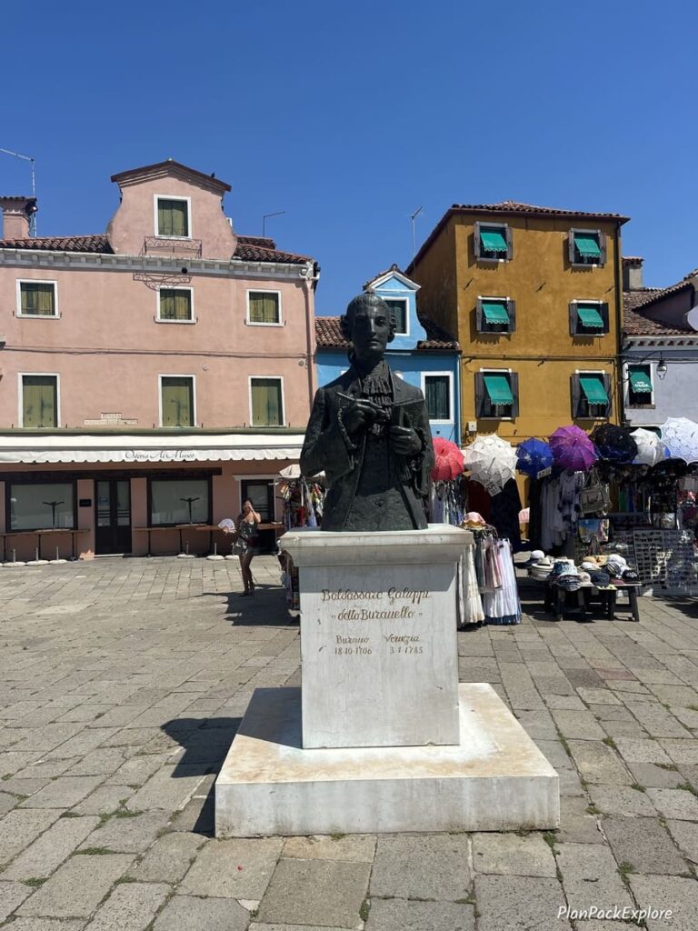 A statue in the center of the main square on Burano Island near Venice, Italy.